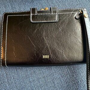 Black wristlet by Hobo